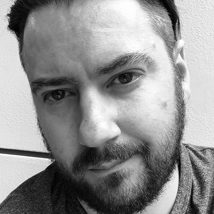 Bill Taylor - close-up black and white photo of a person